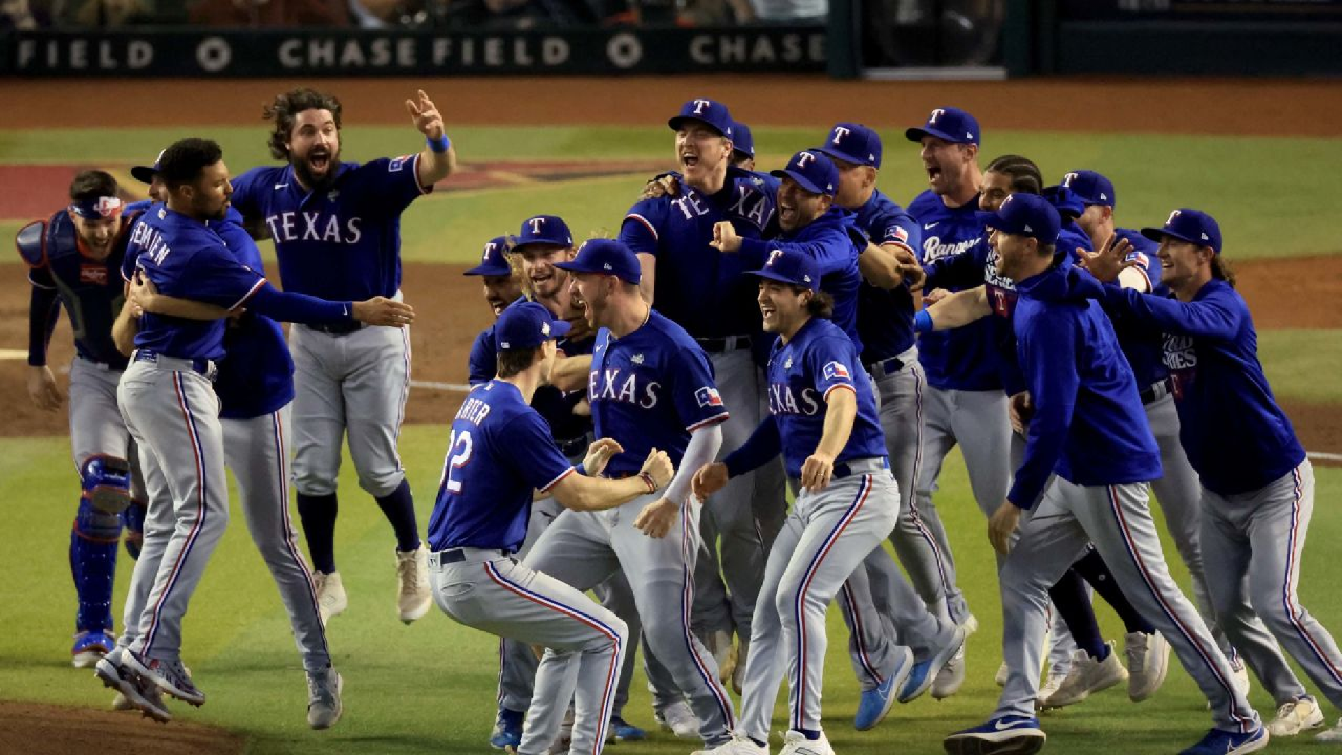 Texas Rangers celebrating after defeating Arizona Diamondbacks for first World Series