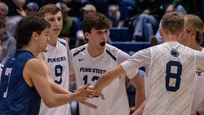 Men's Volleyball celebrating vs. George Mason