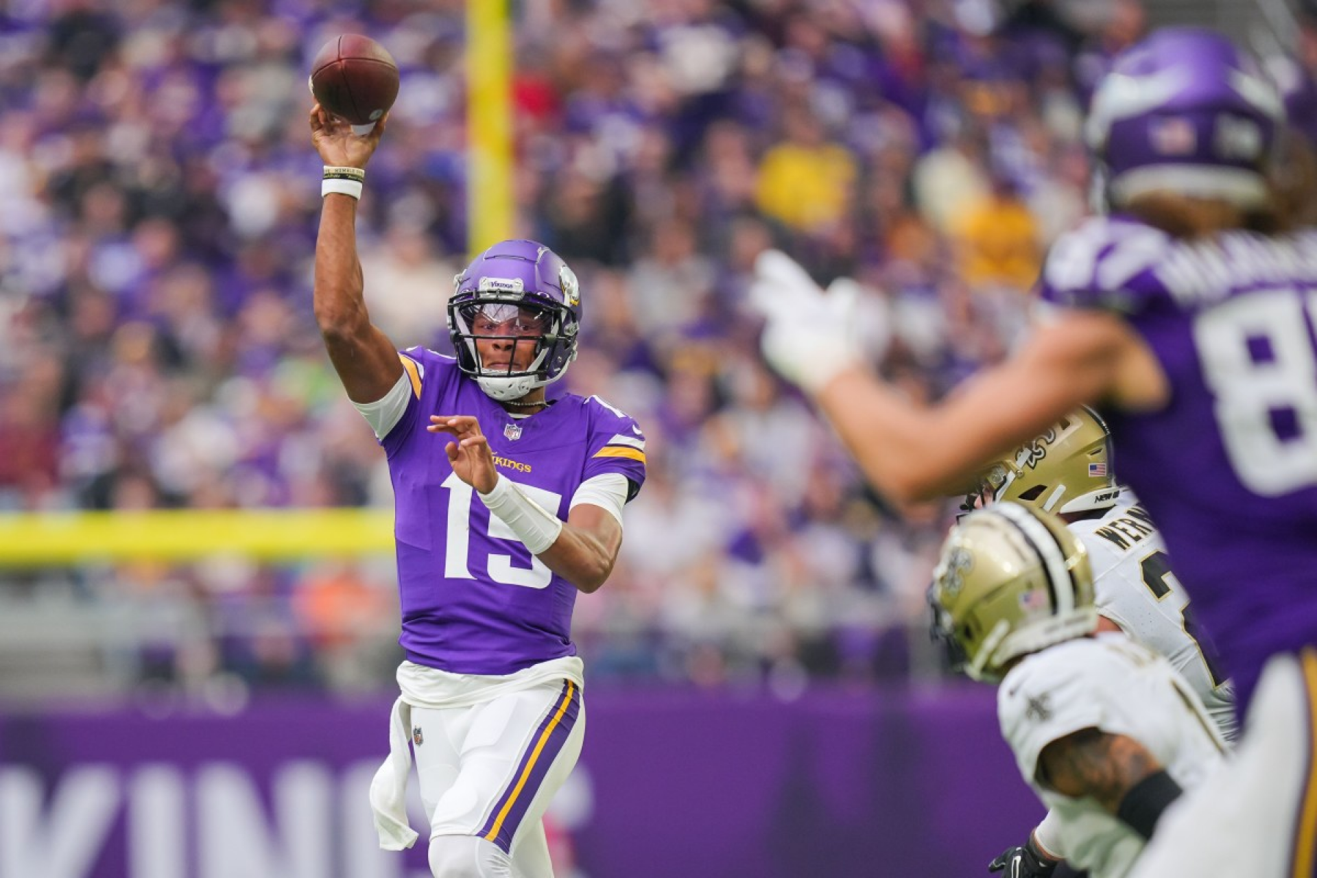 Josh Dobbs throwing a pass against the Saints