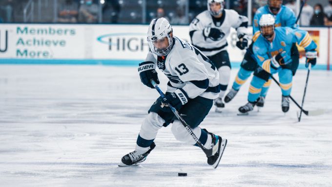 Danny Dzhaniyev with the puck vs LIU in 2021