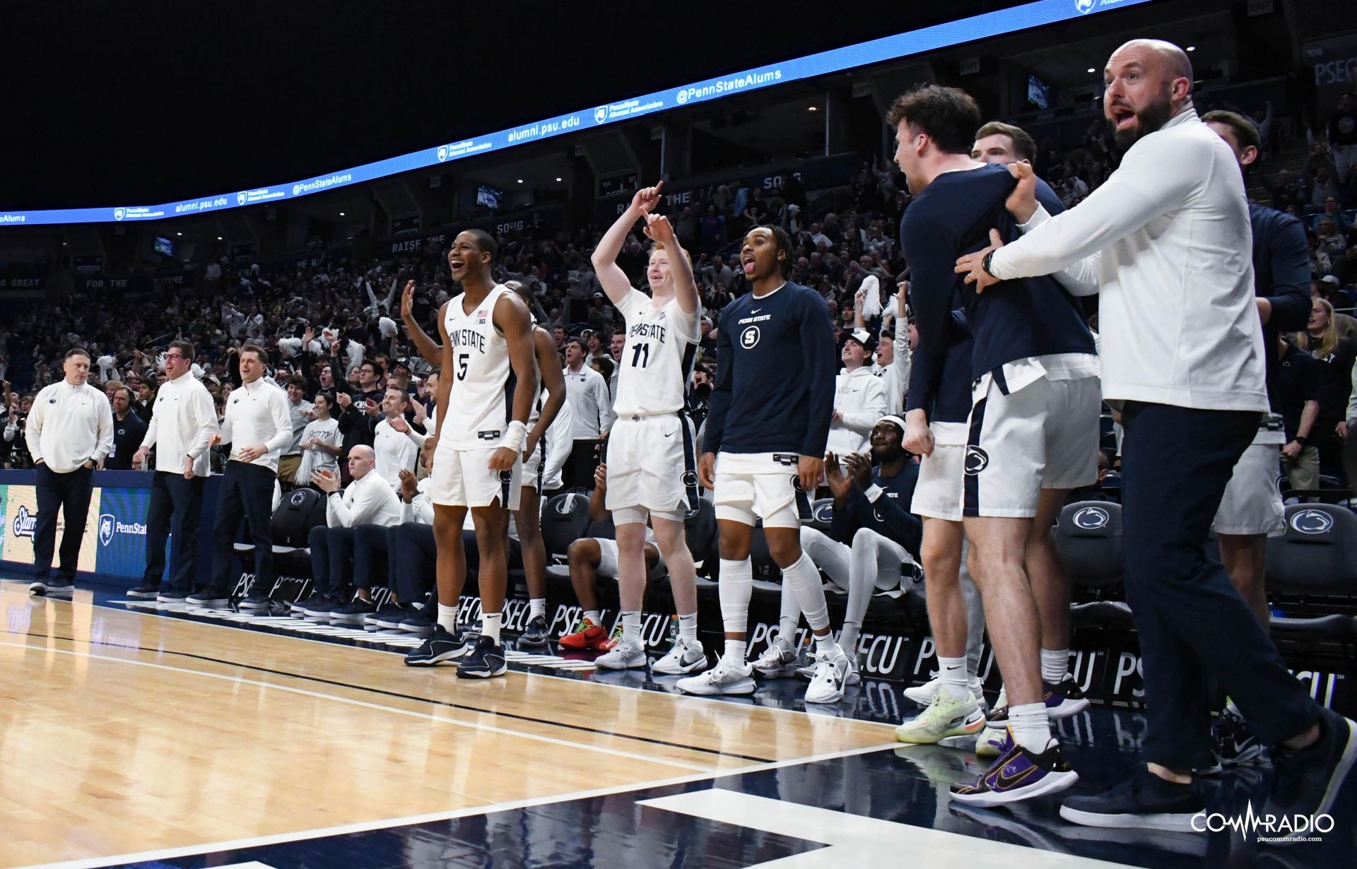 Penn State bench celebrating against Iowa