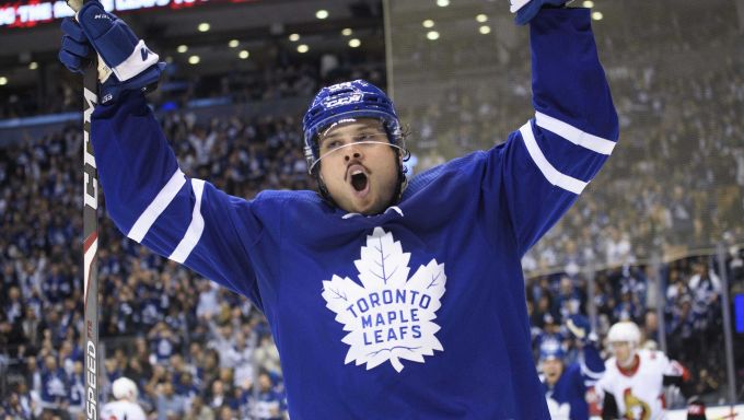 Auston Matthews celebrates after scoring against the Ottawa Senators