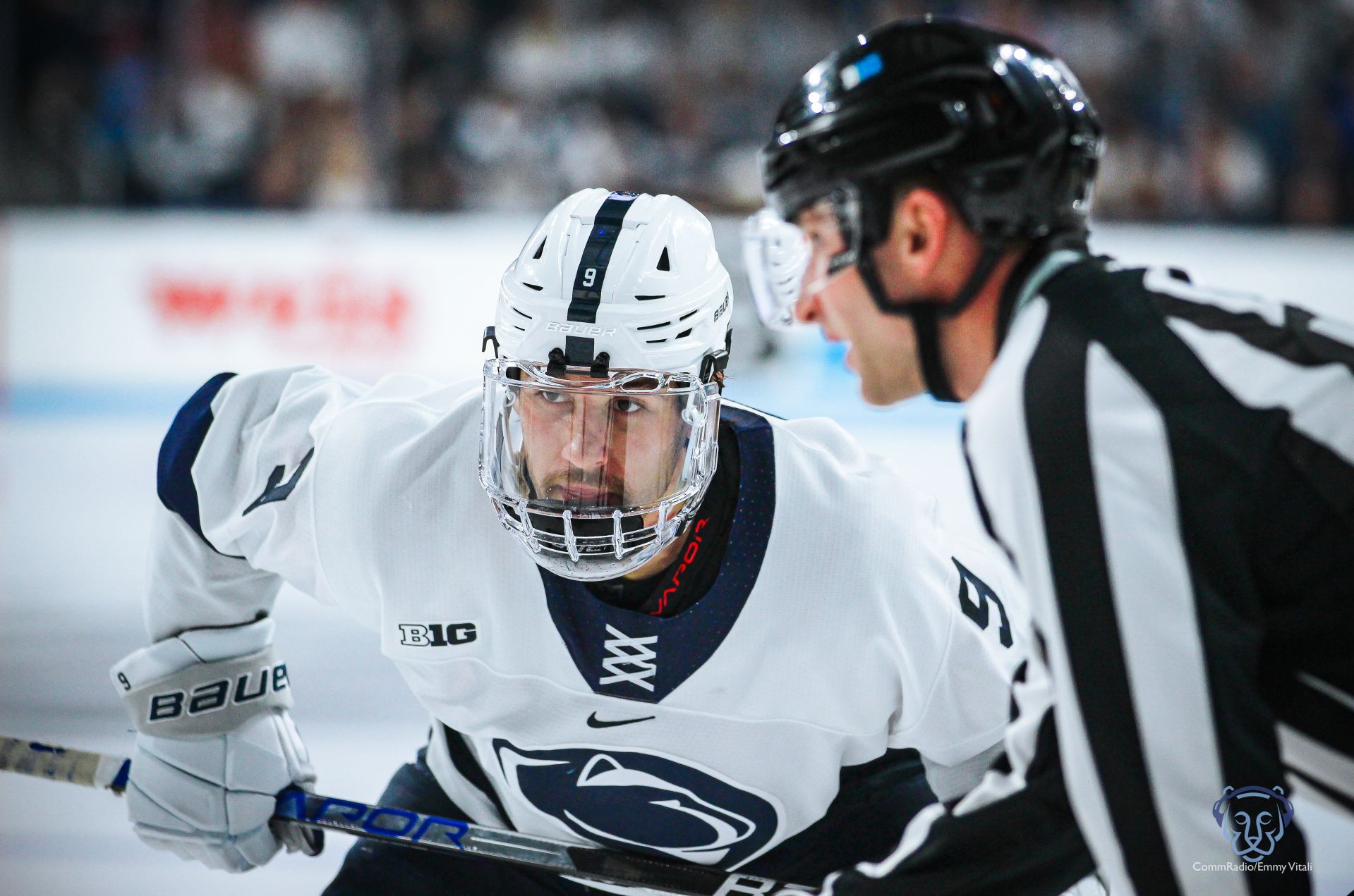 Xander Lamppa taking a faceoff against No. 1 Michigan