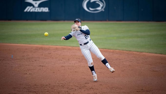 Jiselle Hernandez making a throw to first vs. Maryland