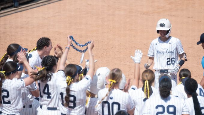 Liana Jones celebrating HR against Michigan State
