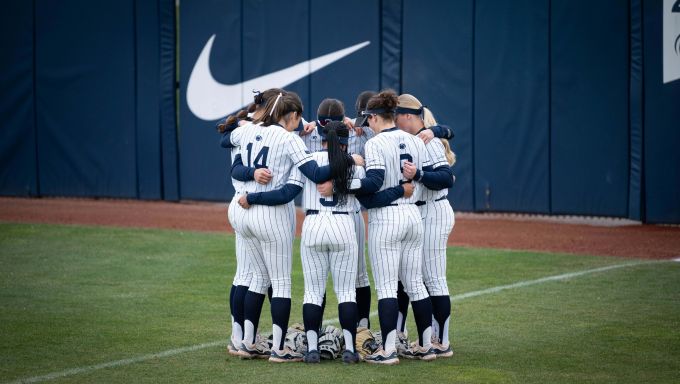 PSU Softball in a huddle