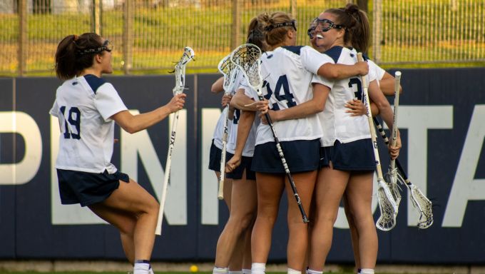 Penn State Women's Lacrosse celebrating a goal against Johns Hopkins