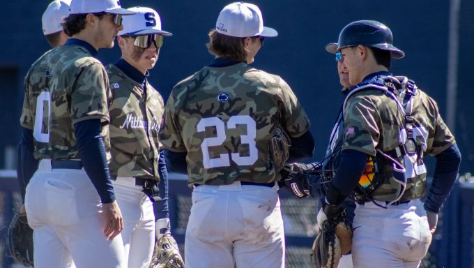 Penn State defense meeting on the mound against Michigan