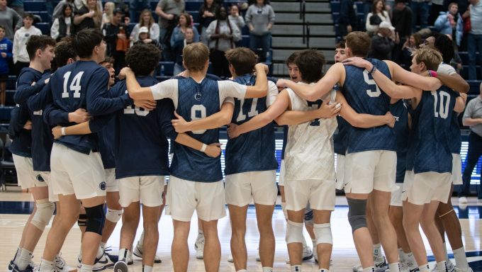 Penn State men's volleyball celebrating after a 3-0 set victory over King