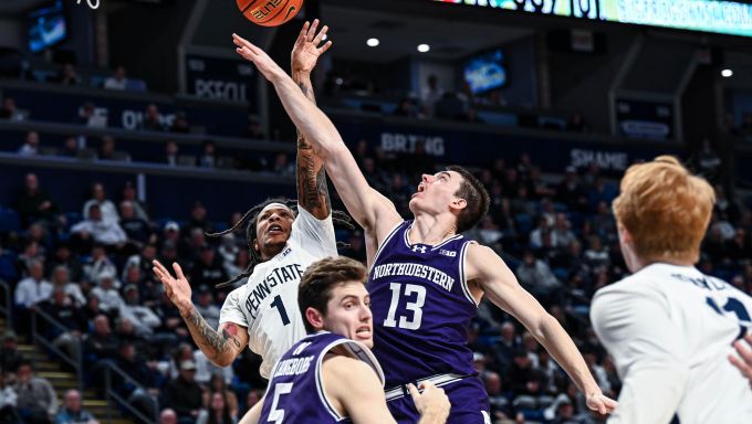 Ace Baldwin Jr. fights for a jump ball against Northwestern