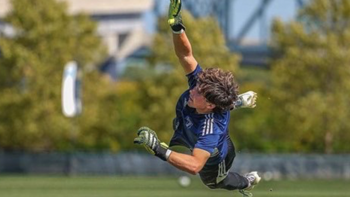 Jonathan Evans diving to make a save
