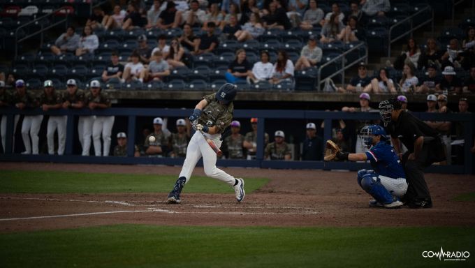 A Penn State batter swings at a pitch
