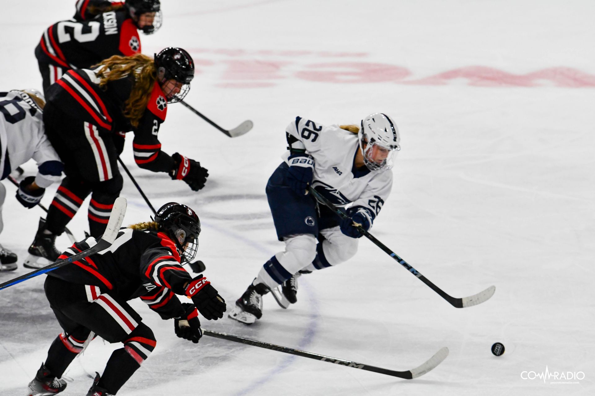 Womens hockey with the puck