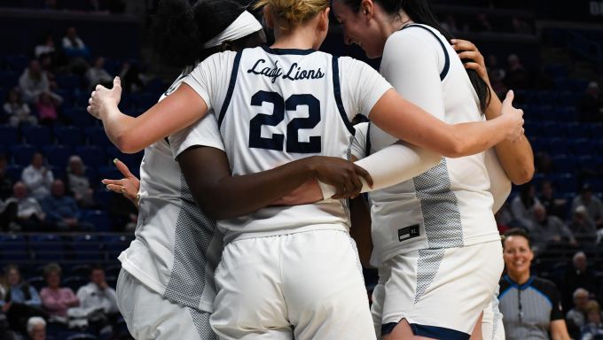 Lady Lions in the huddle against Purdue