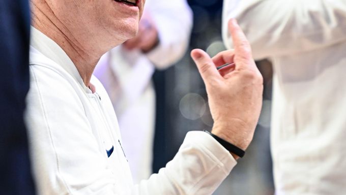 Mike Rhoades talking to his team during the game against Northwestern