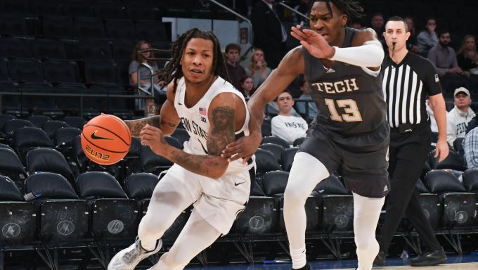 Ace Baldwin Jr. driving to the net against Georgia Tech