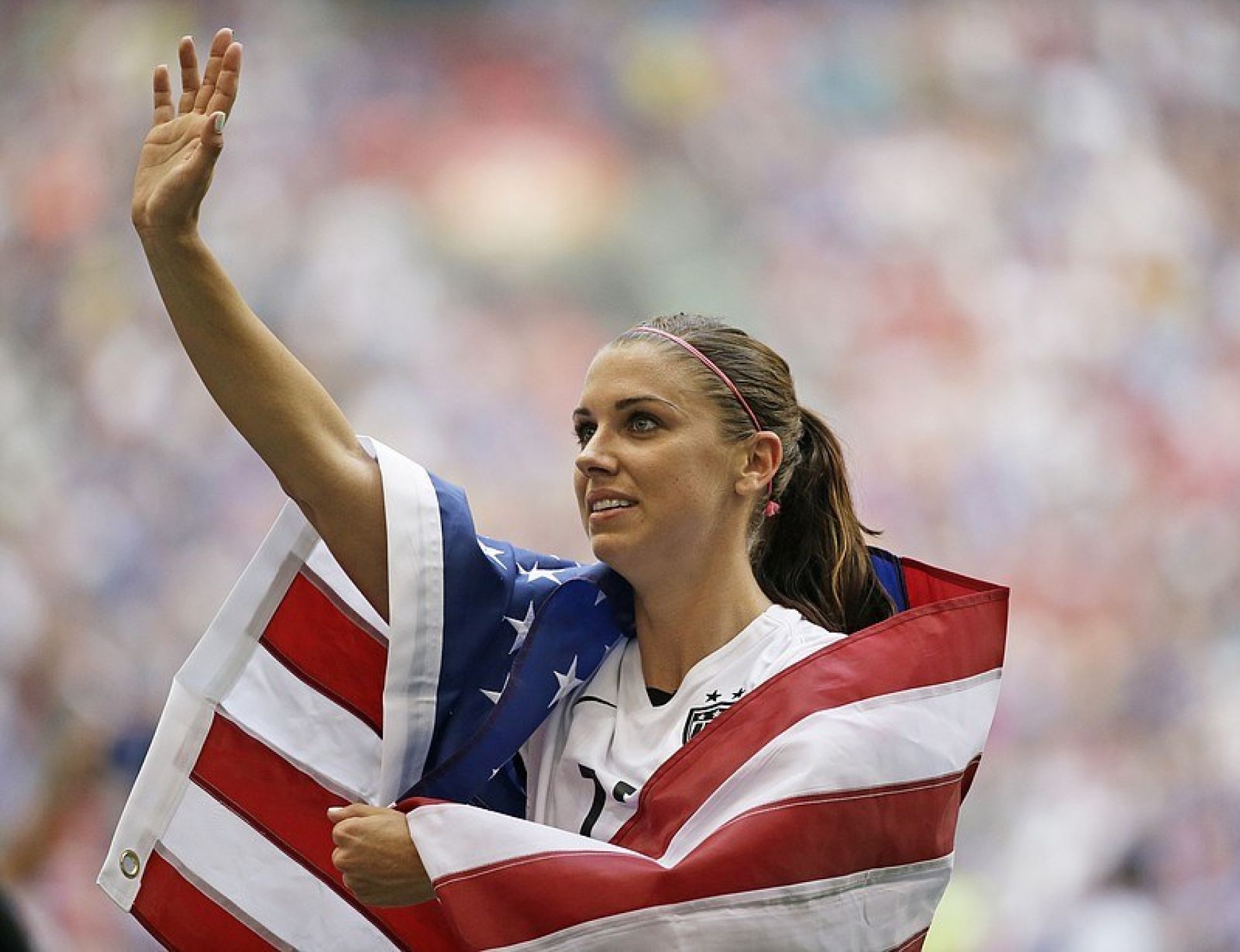 Morgan with american flag wrapped around her