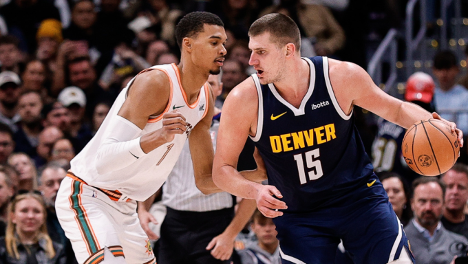 Jokic backing down a defender