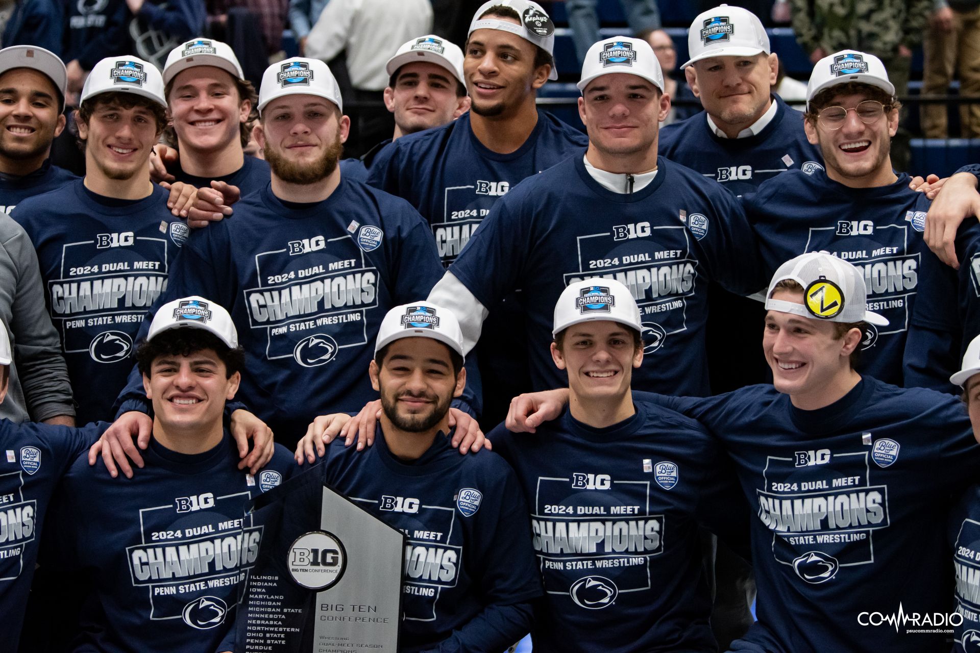 Penn State Wrestling celebrating after defeating Nebraska