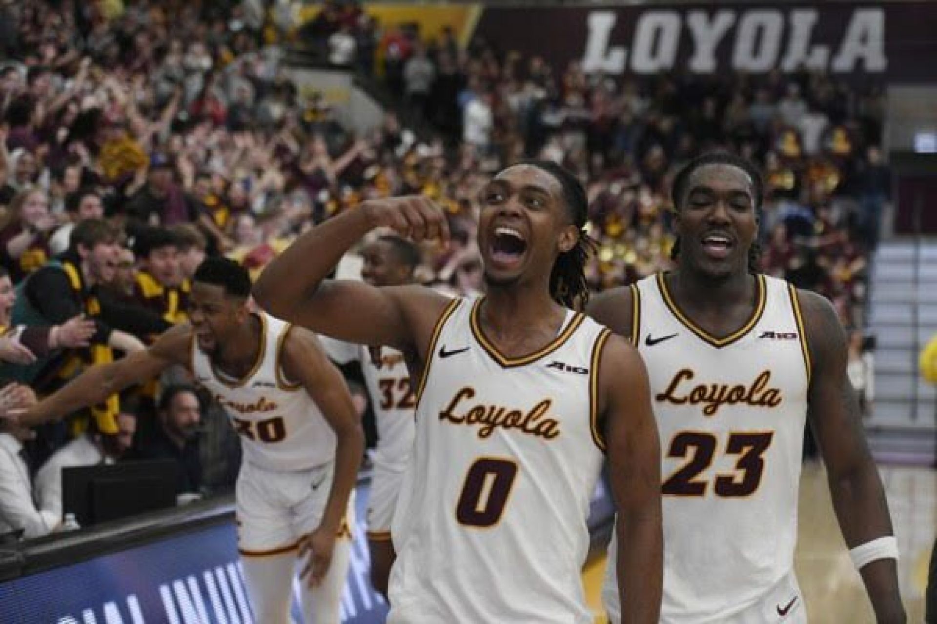 Loyola Chicago Rambles men's basketball celebrating