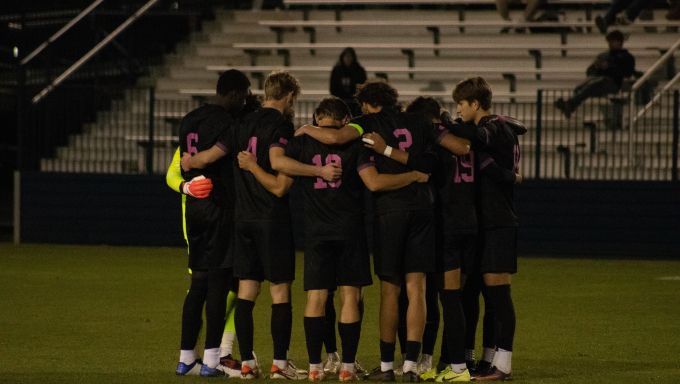Penn State men's soccer in a huddle
