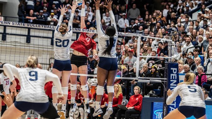 Allie Holland and Zoe Weatherington combine for a block against Wisconsin