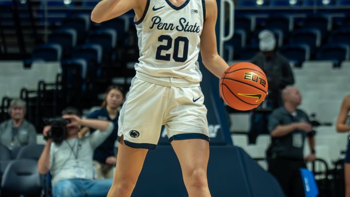 Makenna Marissa taking the ball up court