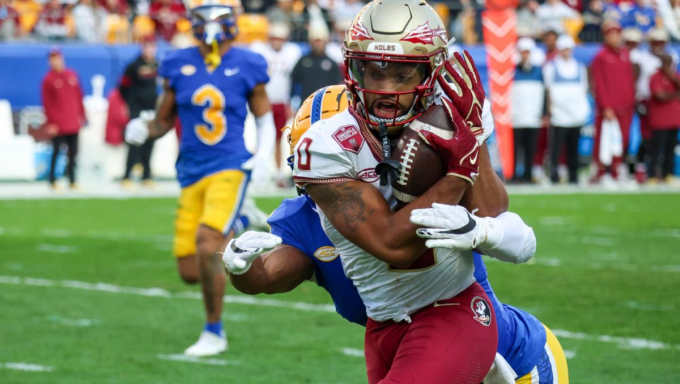 Florida State wide receiver hauling in a long ball