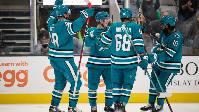 Sharks celebrating after scoring a goal