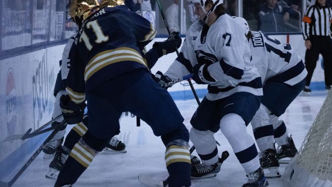 Penn State and Notre Dame battling for the puck