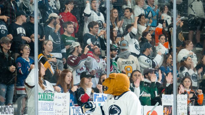 Penn State Nittany Lion waving to the Roar Zone
