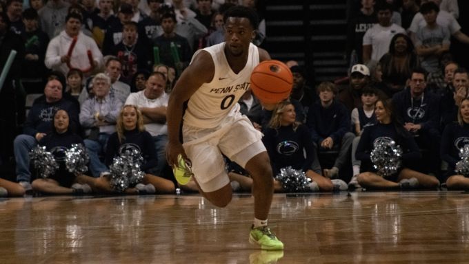 Penn State guard Kanye Clary taking the ball up court