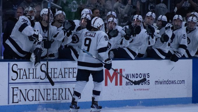 Xander Lamppa celebrates with the Penn State bench after scoring shootout goal