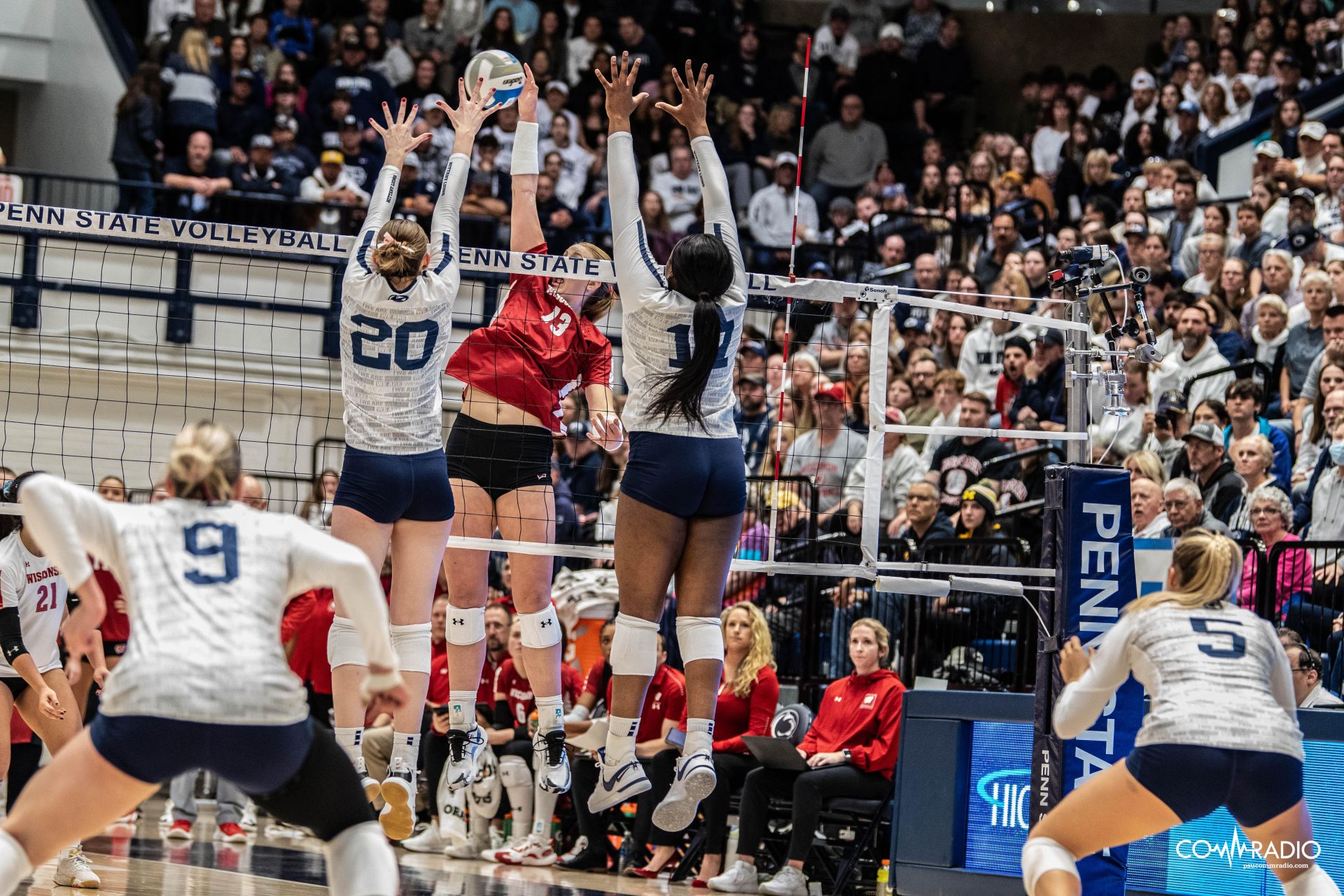 Allie Holland and Zoe Weatherington combine for a block against Wisconsin