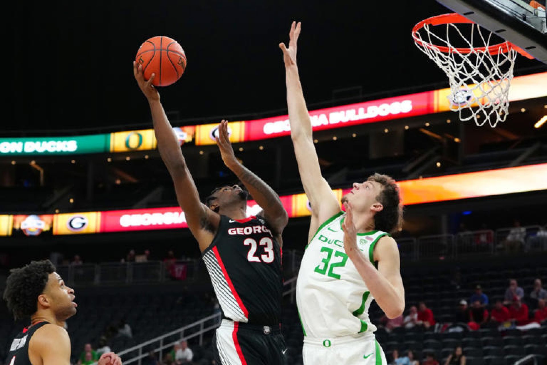 Georgia Bulldogs forward Jalen DeLoach (23) shoots against Oregon Ducks center Nate Bittle (32) during the second half at T-Mobile Arena