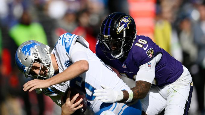 Lions quarterback Jared Goff is sacked by Ravens cornerback Arthur Maulet during the first half on Sunday, Oct. 22, 2023, in Baltimore.