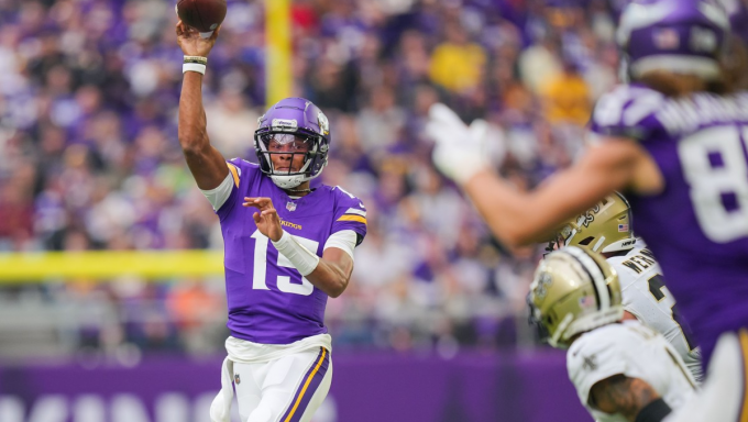 Josh Dobbs throwing a pass against the Saints