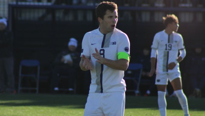 Peter Mangione cheering on team during Michigan match