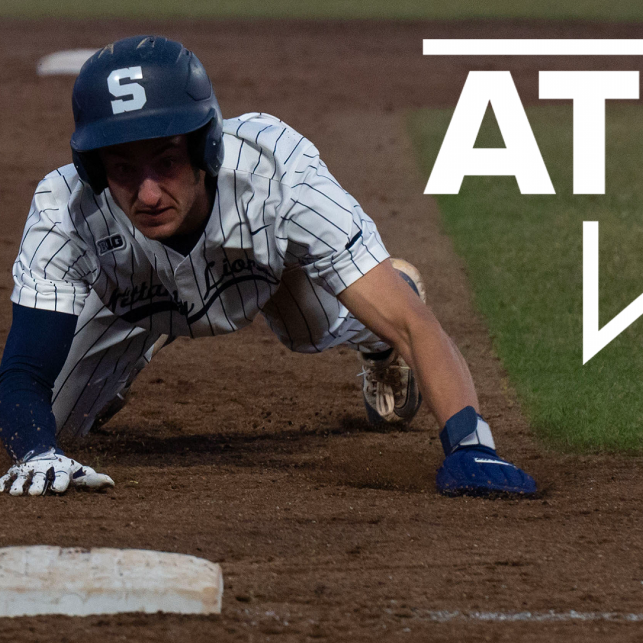 Penn State base runner sliding into third base as the throw comes in from St. Bonaventure