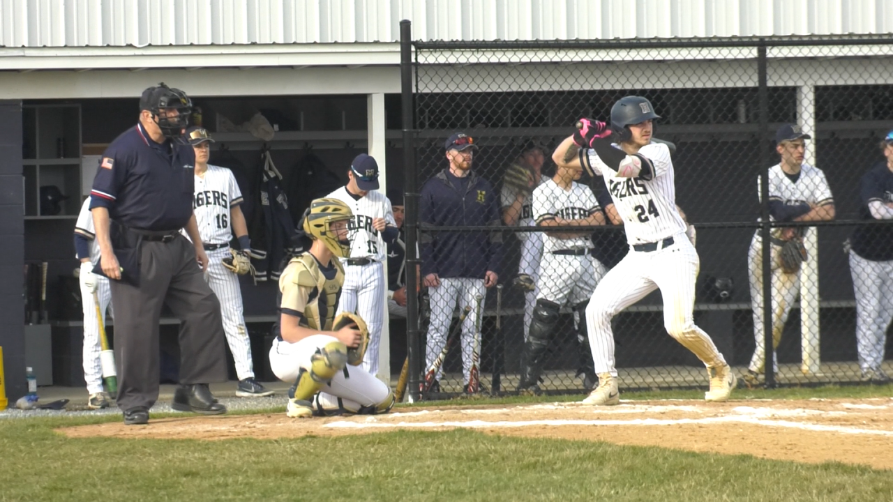 Hollidaysburg EJ Ulery up to bat hitting a two RBI double