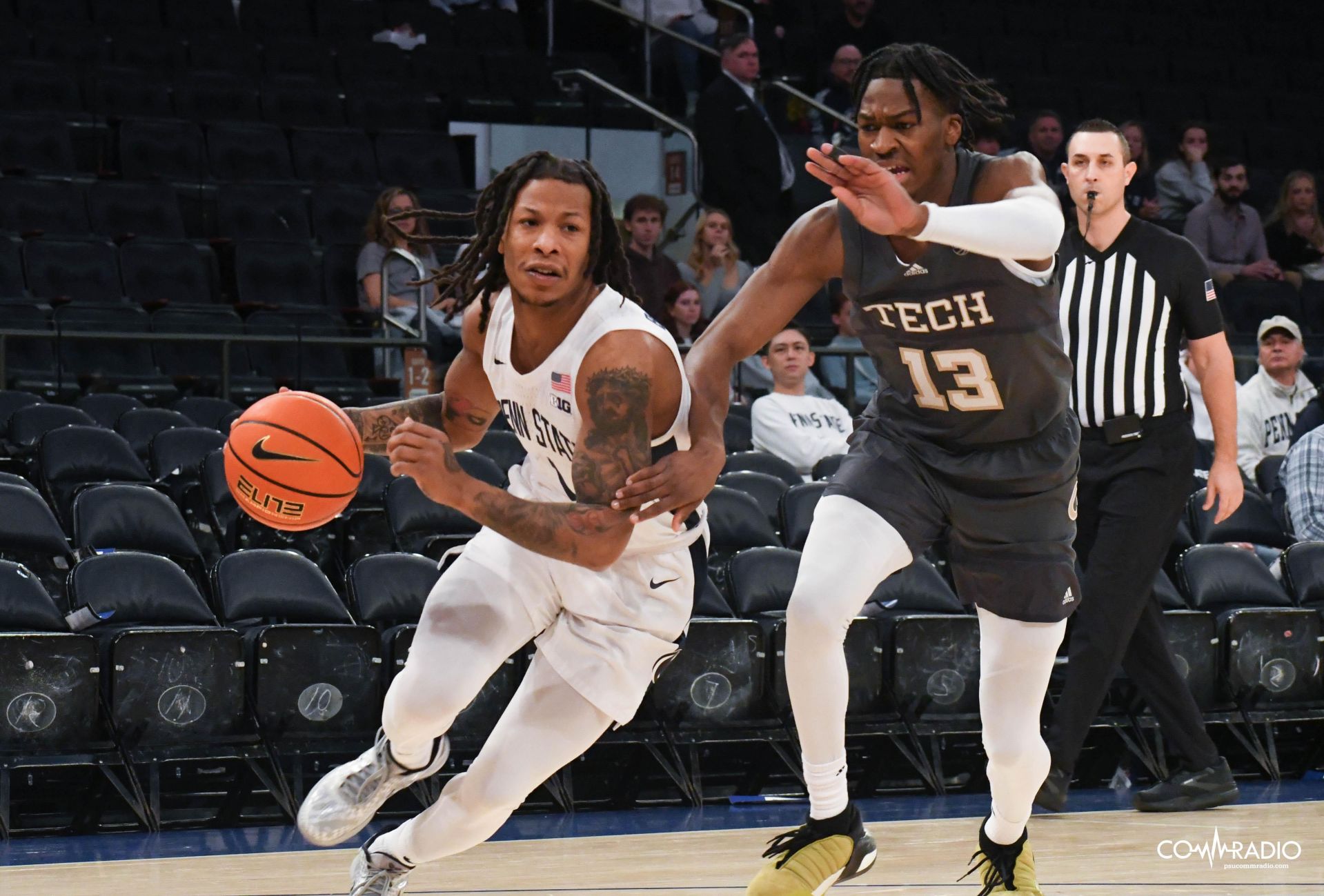 Ace Baldwin Jr. driving to the net against Georgia Tech