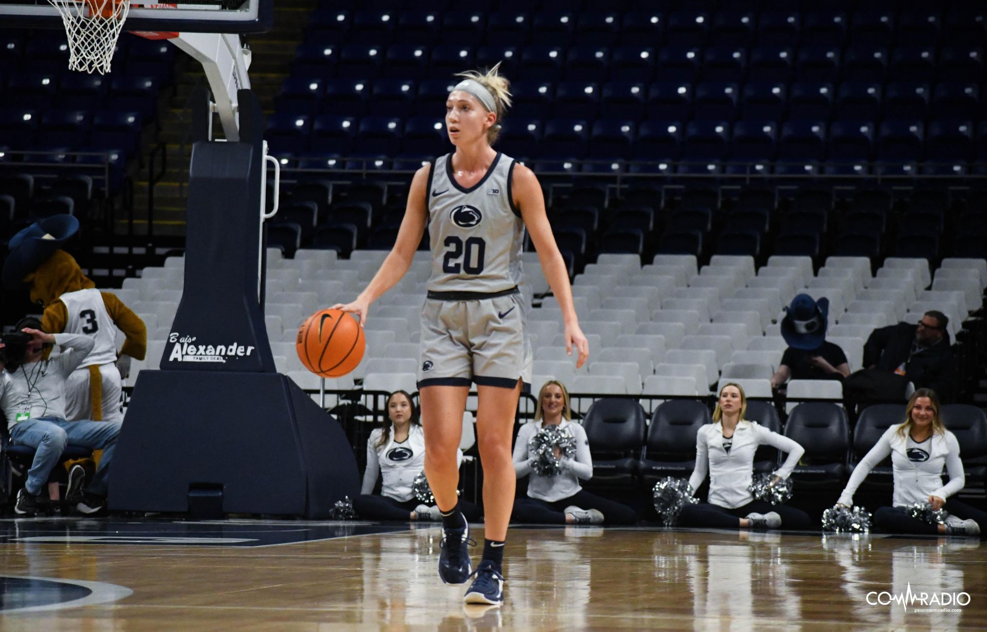 Makenna Marisa taking the ball up court against Radford