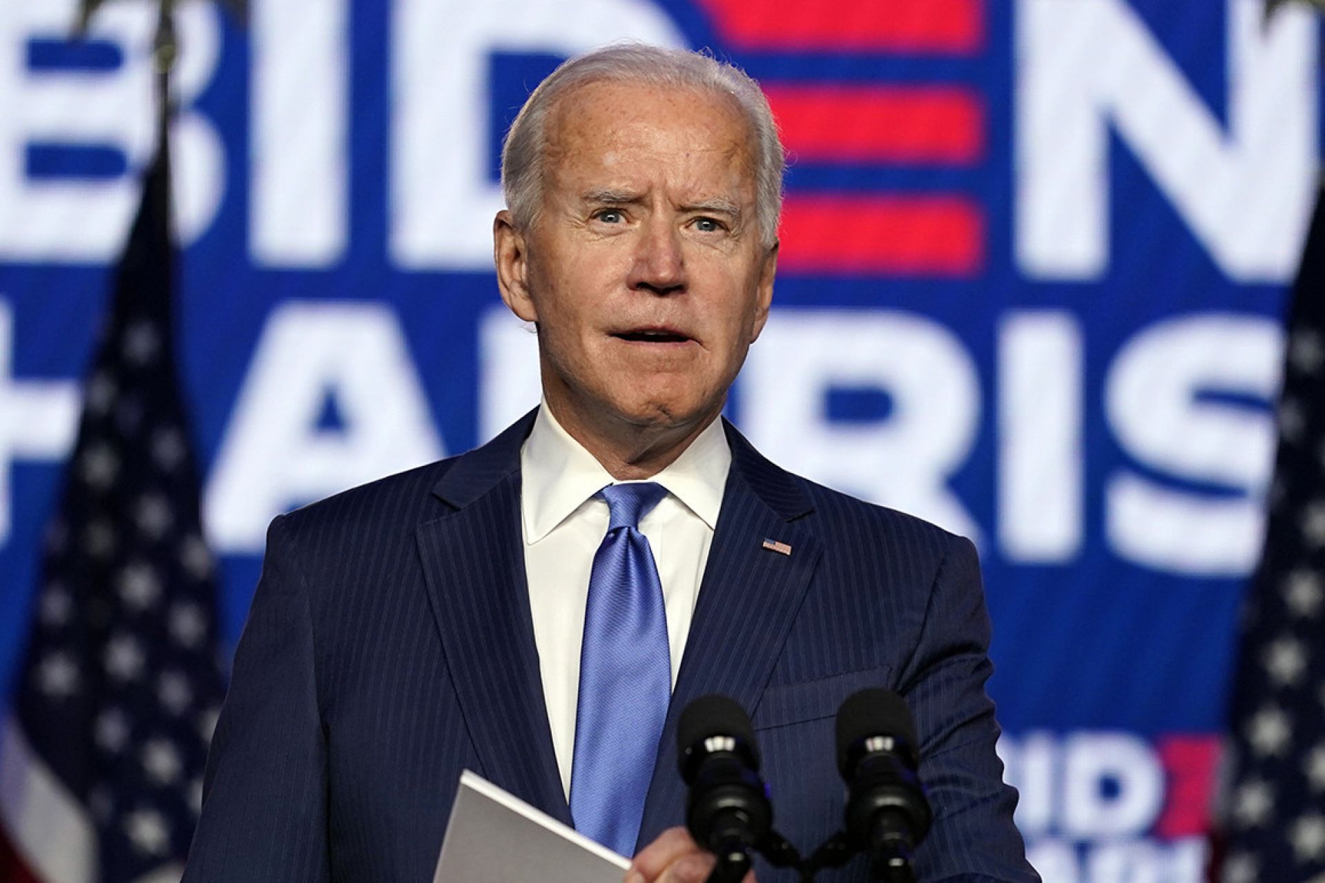 Biden speaking at podium