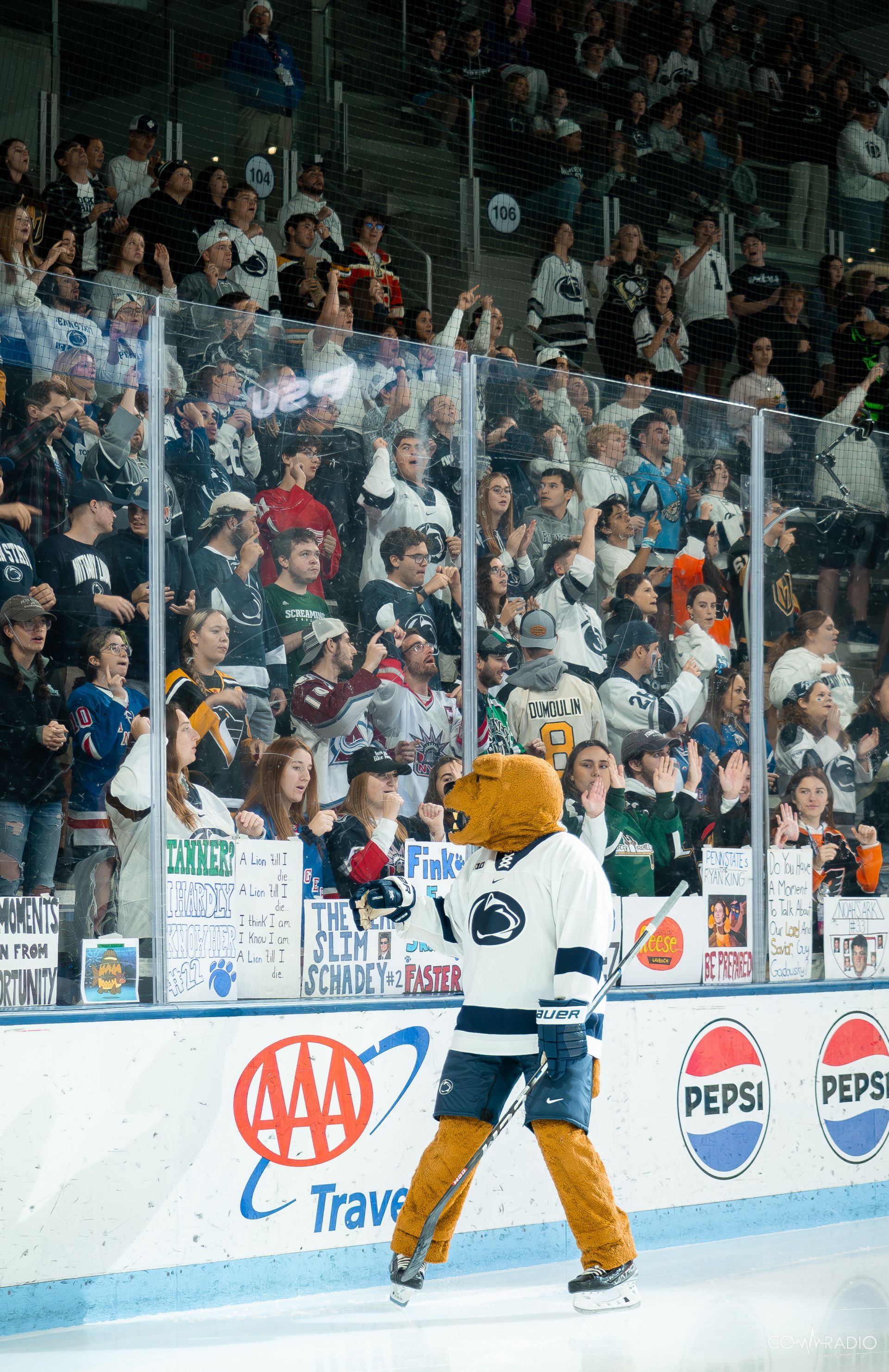 Penn State Nittany Lion waving to the Roar Zone