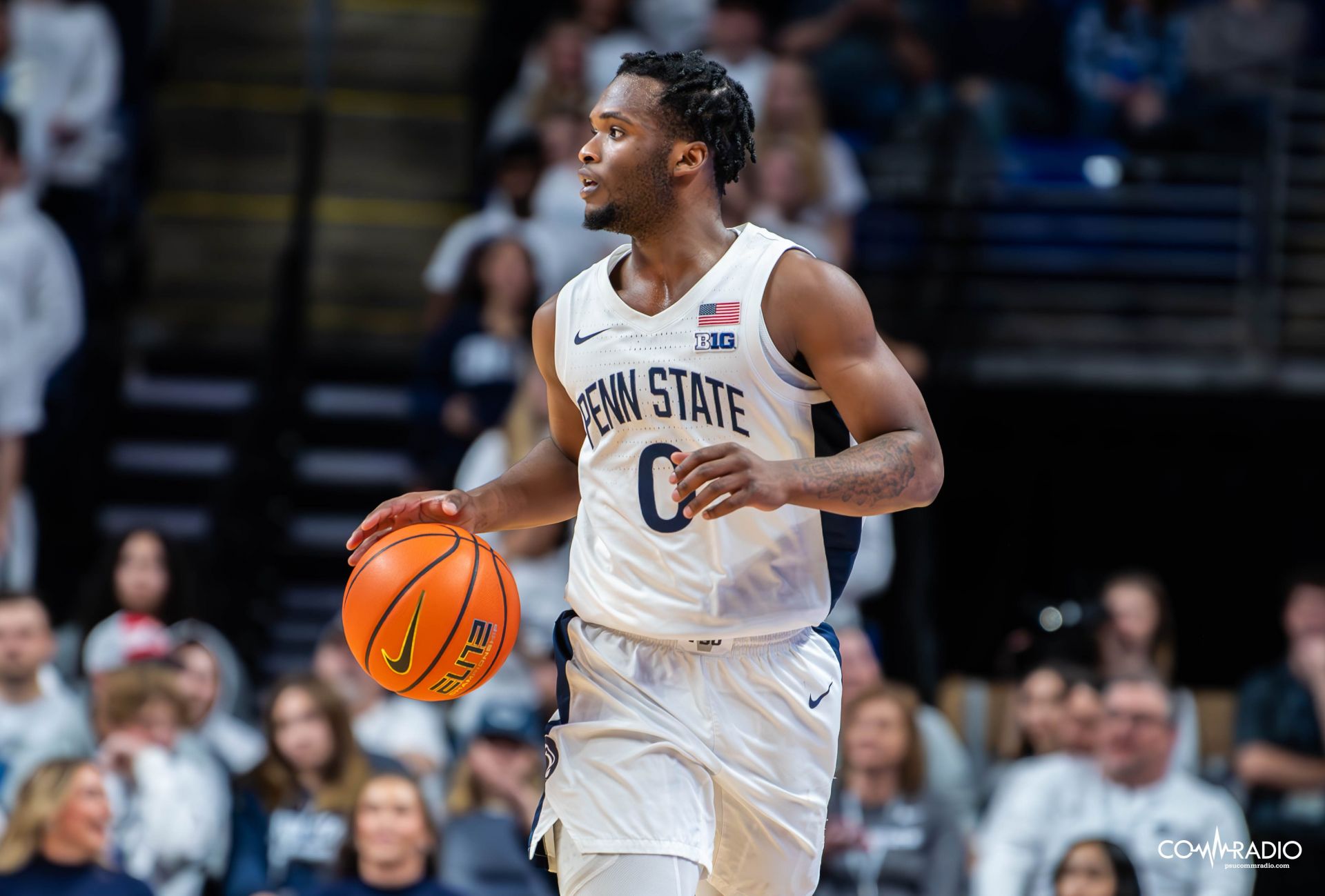 Kanye Clary taking the ball upcourt against Ohio State