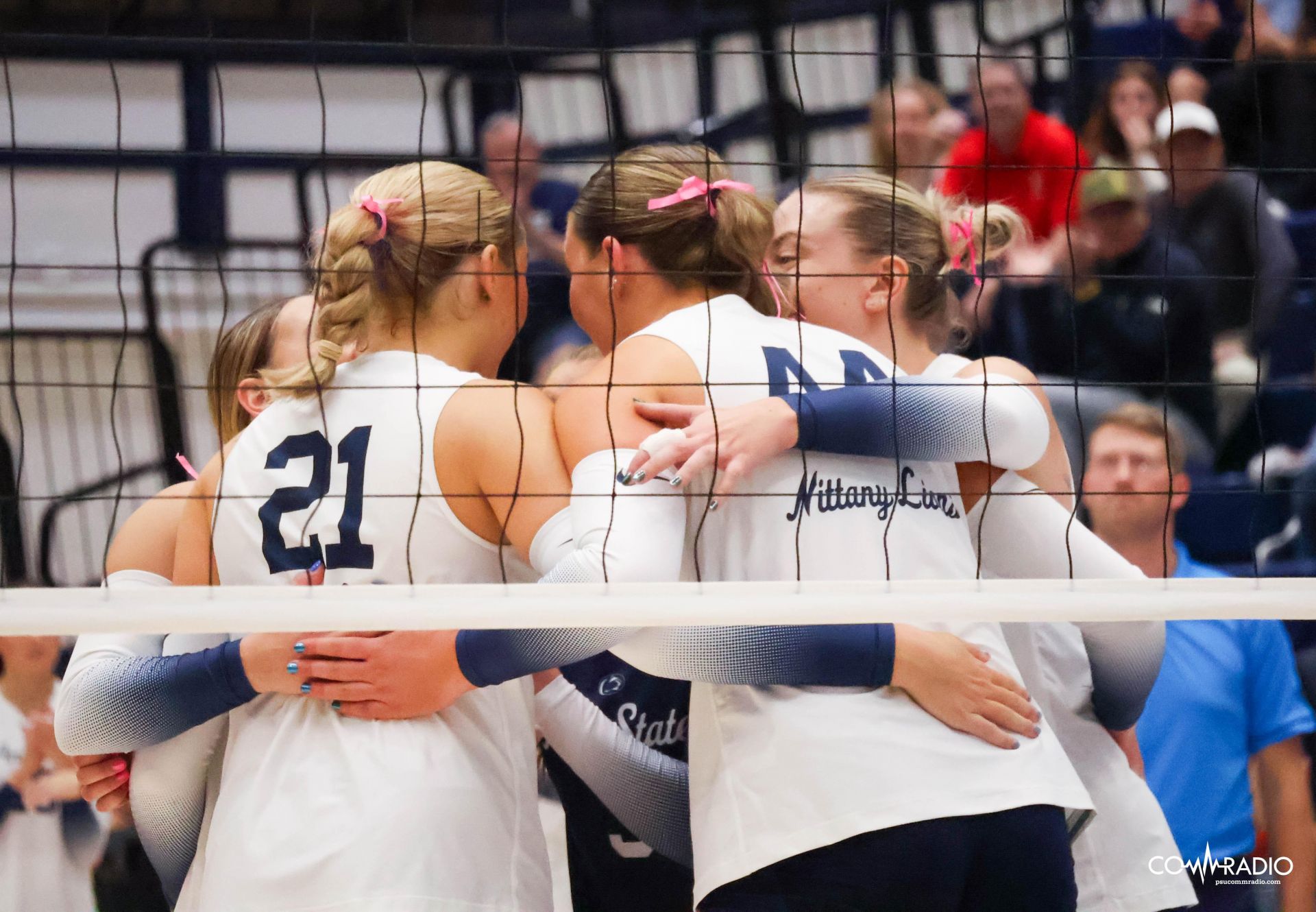 volleyball in a huddle