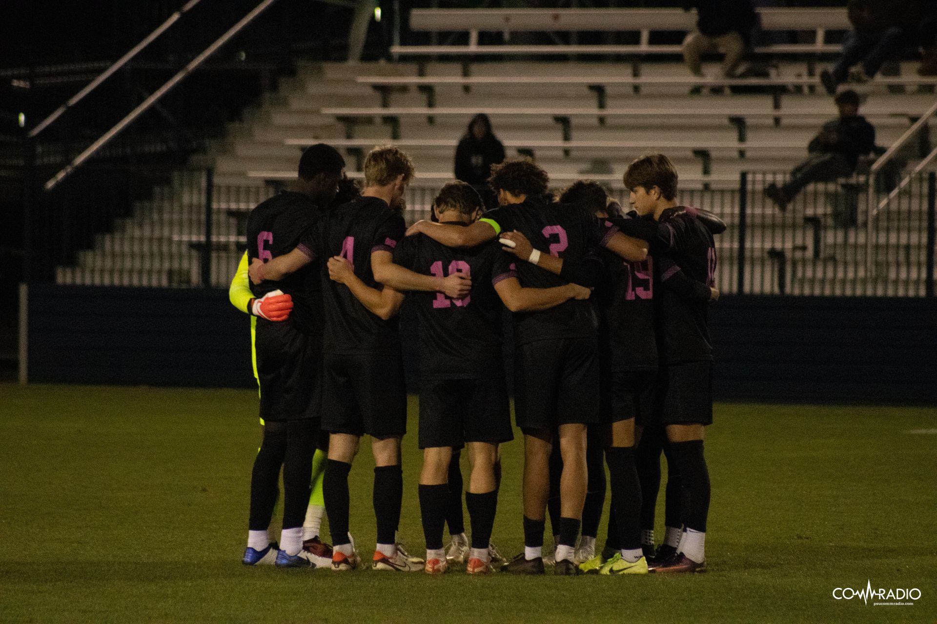 Penn State men's soccer in a huddle