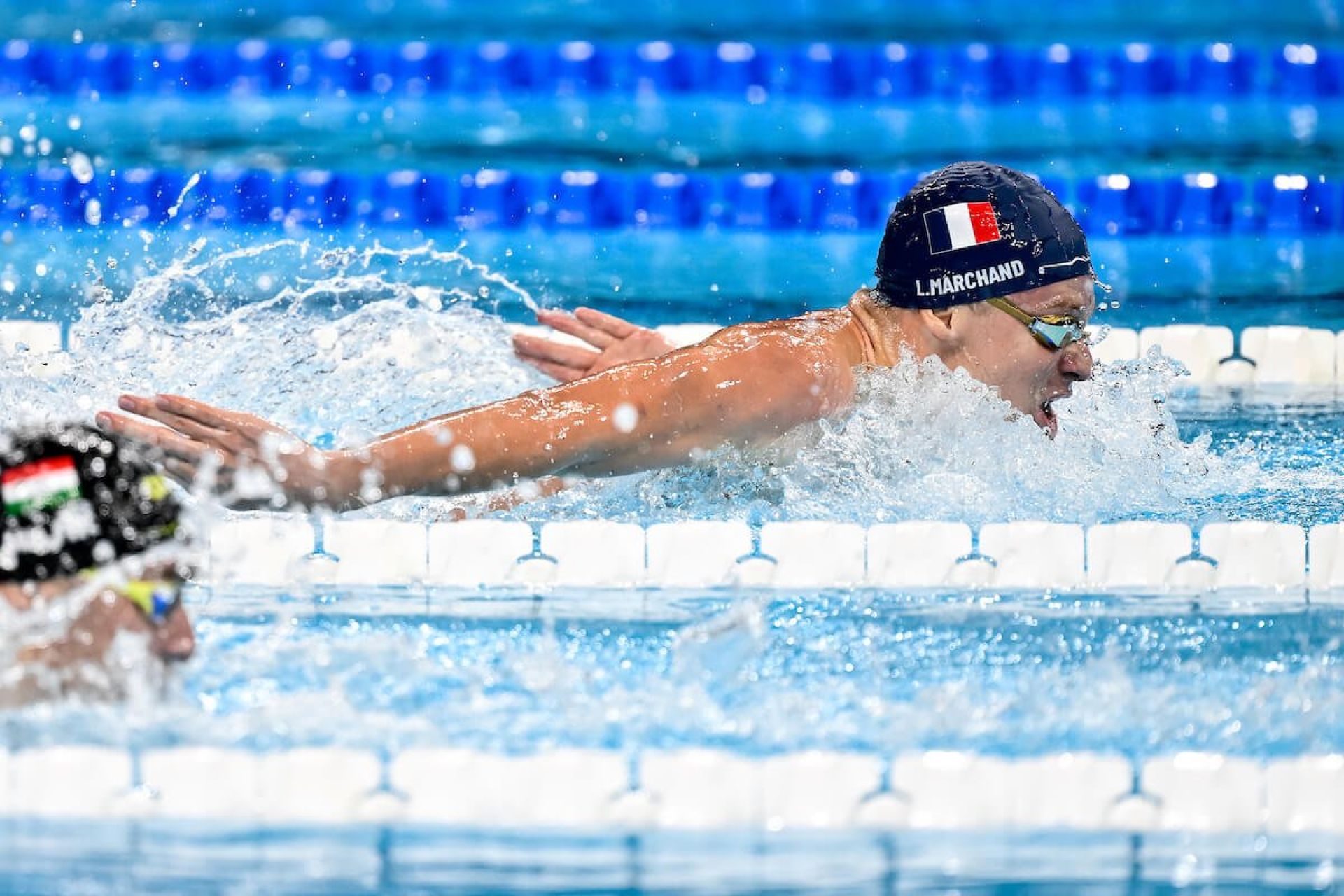 Marchand swimming