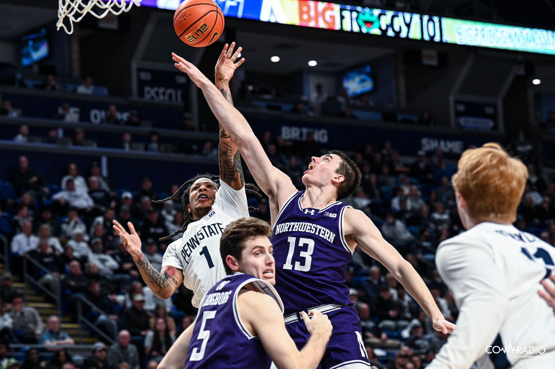 Ace Baldwin Jr. fights for a jump ball against Northwestern