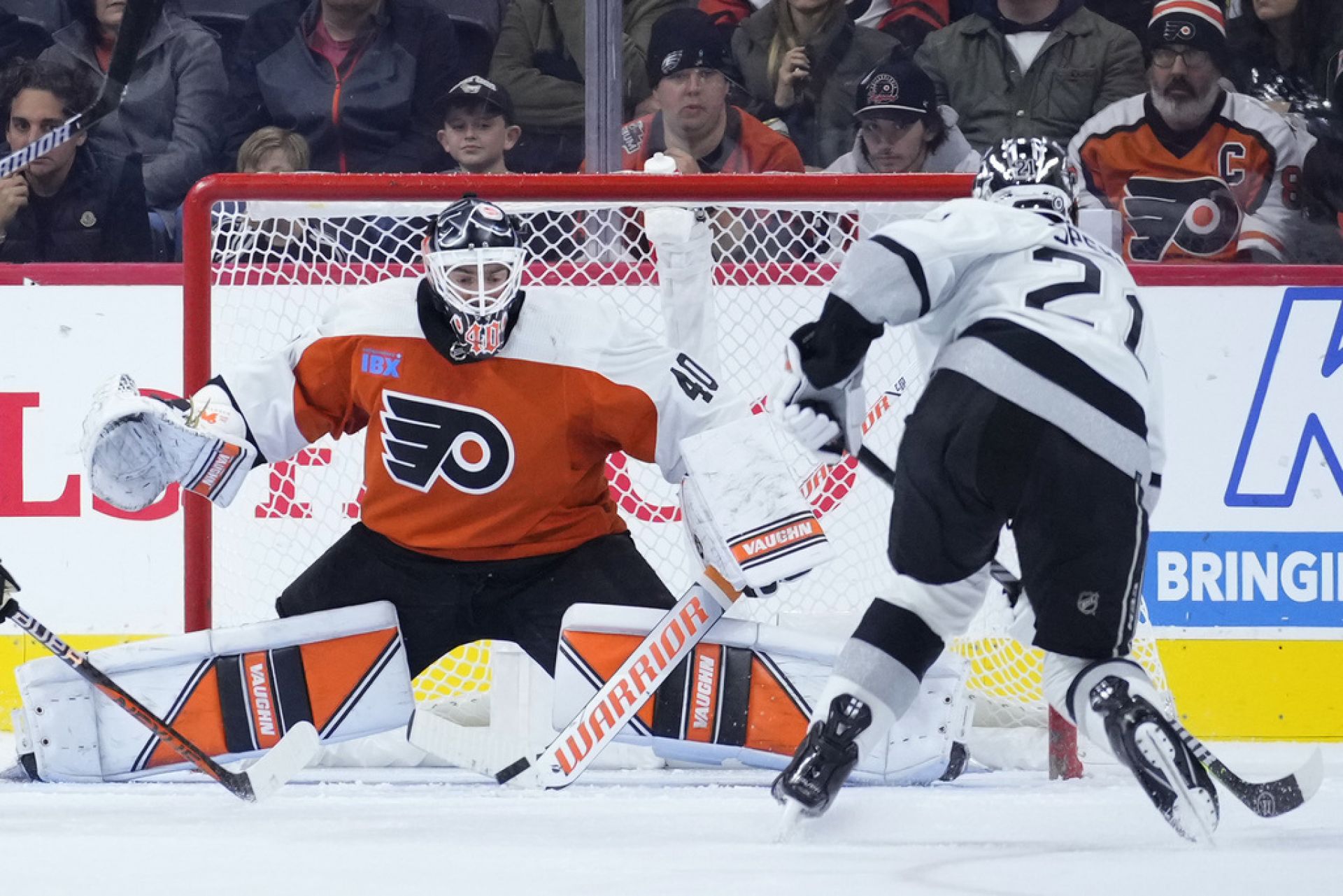 Carter Hart stopping a Los Angeles Kings shot